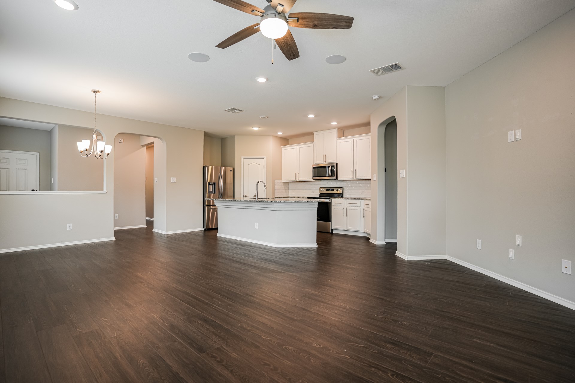 17313 Crazy Arm Road, Unit 233 Round Rock, TX 78664 - Photo 2 of 20 Beautiful open space for living dining and kitchen.
