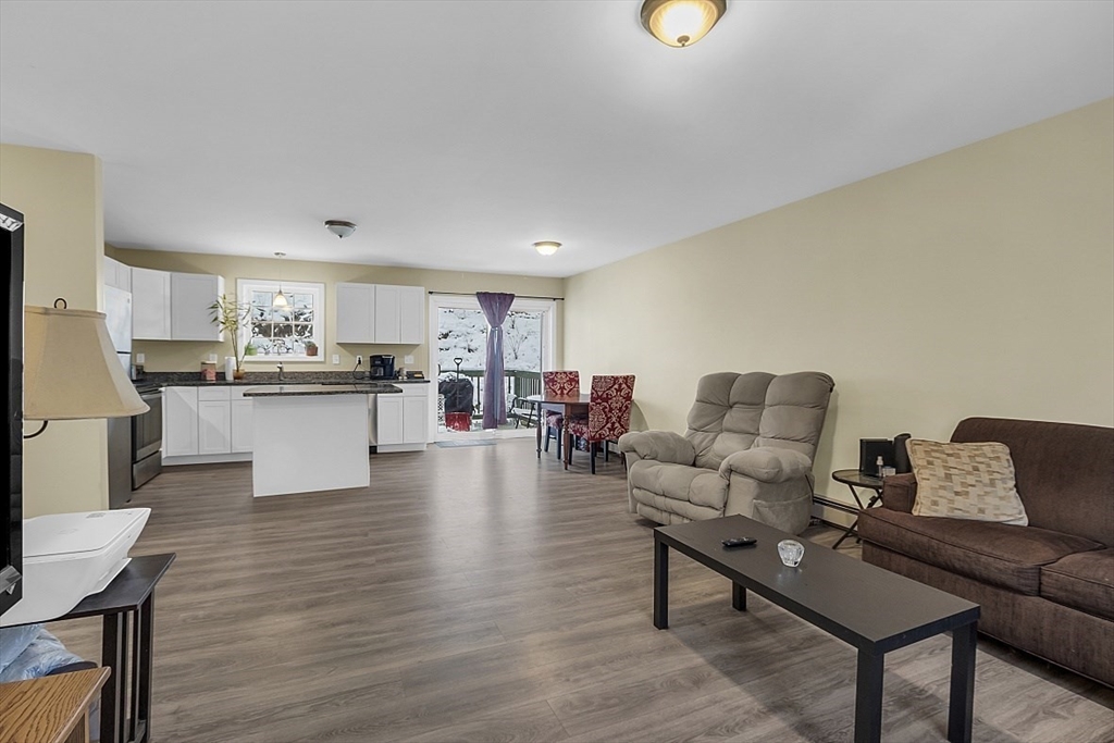 667 Brickyard Road Athol, MA 01331 - Photo 17 of 32 a living room with furniture and kitchen view