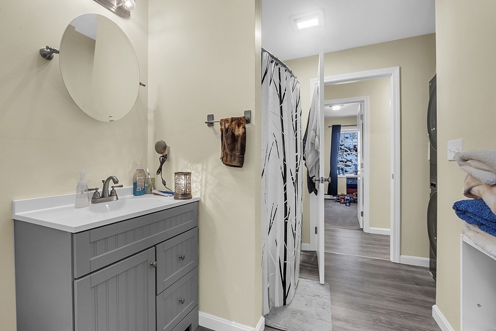 667 Brickyard Road Athol, MA 01331 - Photo 22 of 32 a bathroom with a sink vanity and a mirror