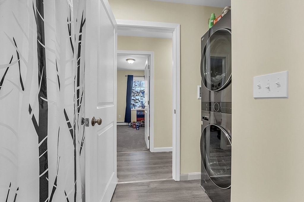 667 Brickyard Road Athol, MA 01331 - Photo 23 of 32 a view of hallway with washer and dryer