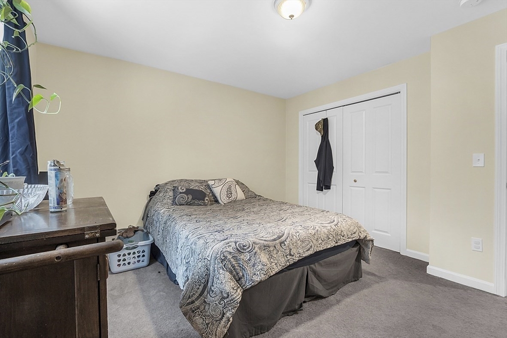 667 Brickyard Road Athol, MA 01331 - Photo 26 of 32 a bedroom with a bed and a desk