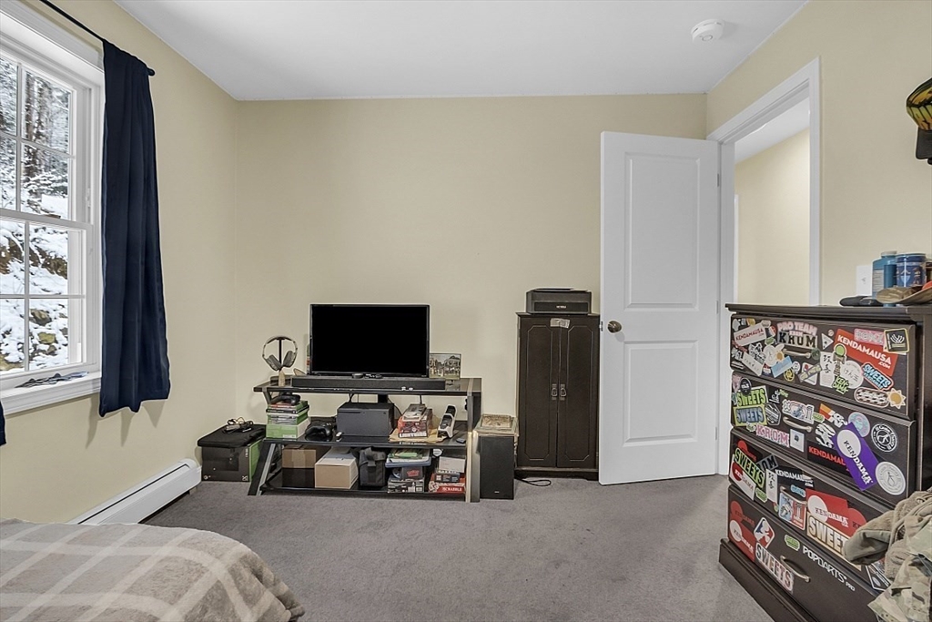 667 Brickyard Road Athol, MA 01331 - Photo 28 of 32 a view of a livingroom with furniture and a window