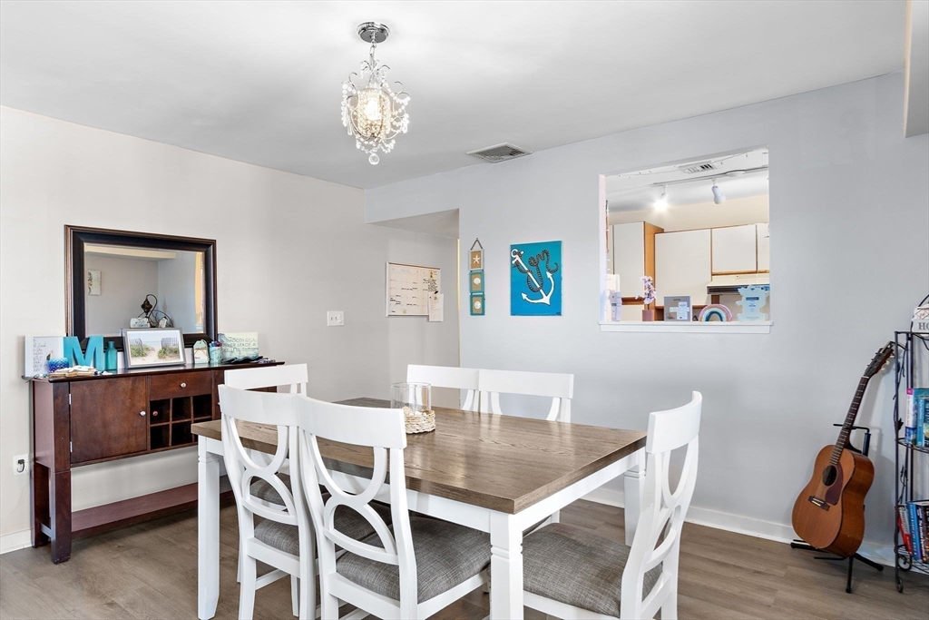 45 Main Street, Unit 21 Wareham, MA 02571 - Photo 5 of 29 a dining room with furniture and window