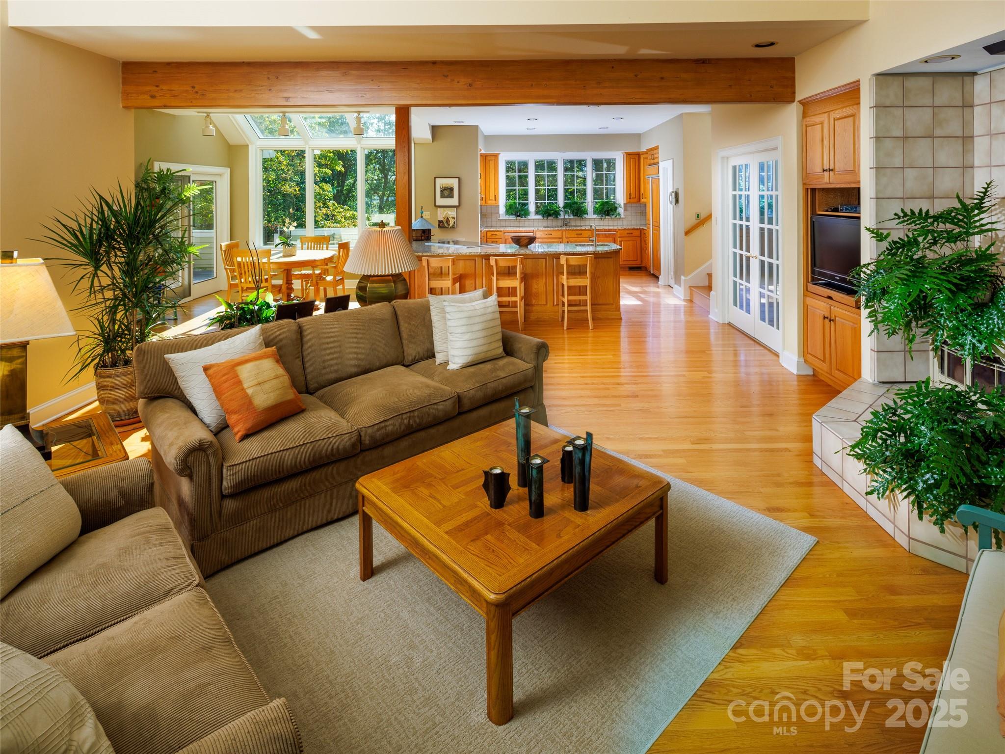 52 Robinhood Road Asheville, NC 28804 - Photo 11 of 19 a living room with furniture and a large window