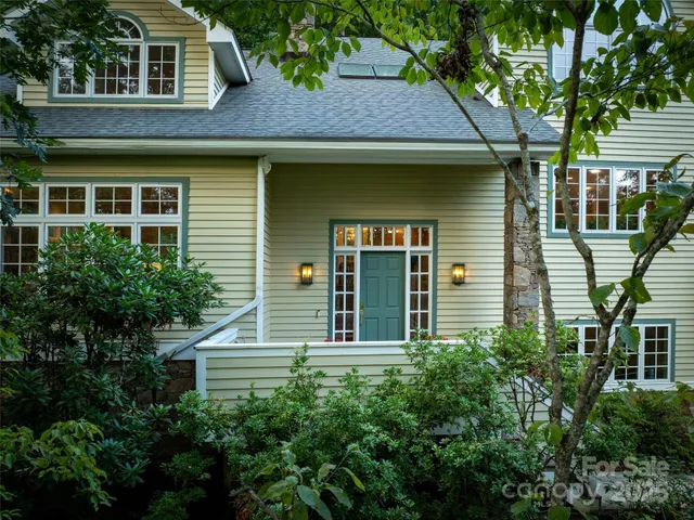 a view of a house with a small garden