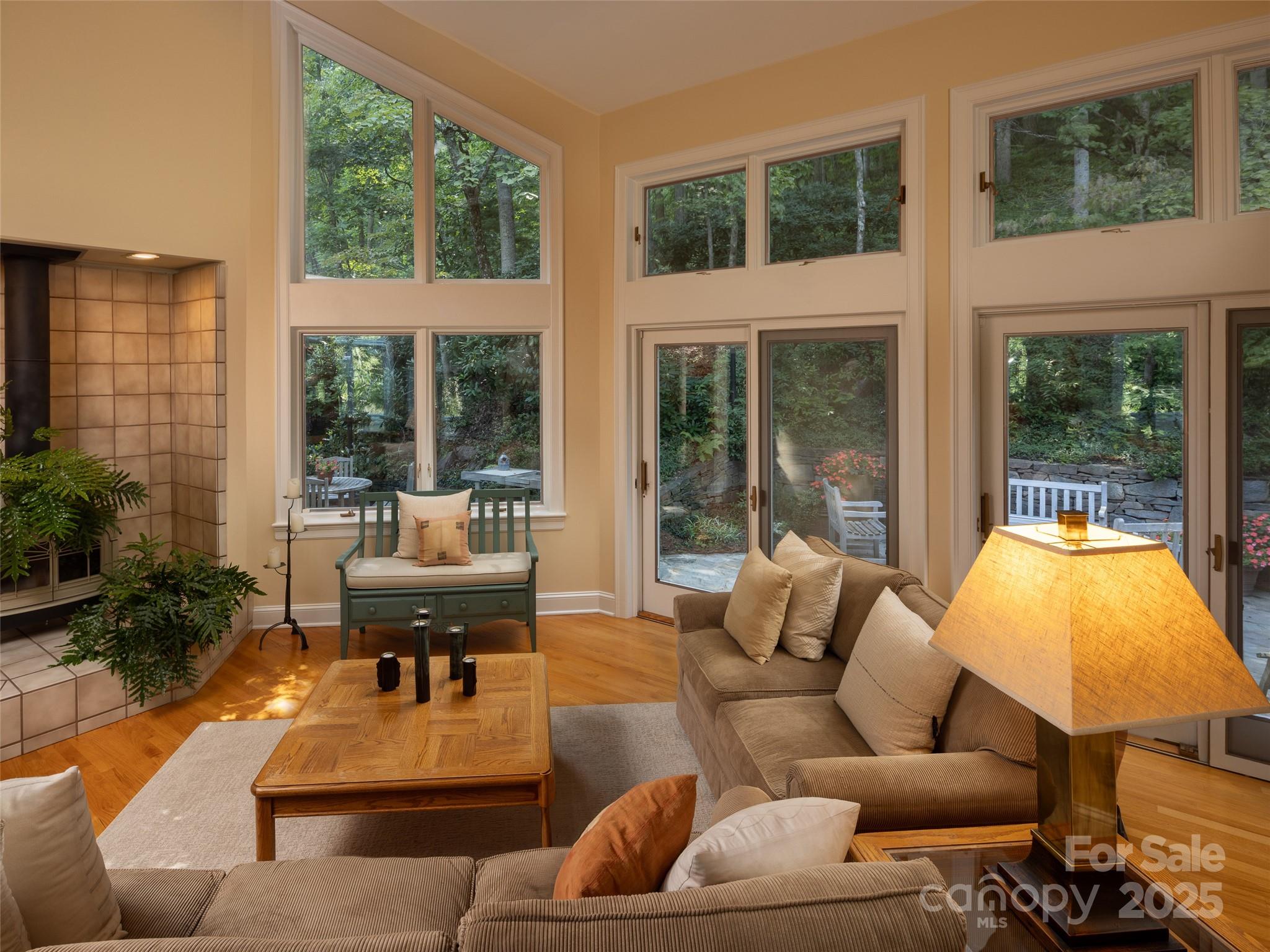 52 Robinhood Road Asheville, NC 28804 - Photo 9 of 19 a living room with furniture and a large window