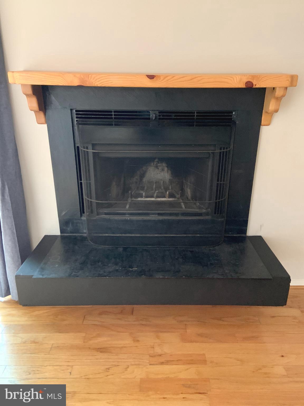 2438 Ridgehampton Court Reston, VA 20191 - Photo 33 of 47 Wood burning fireplace