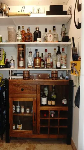 a kitchen with a stove and cabinets