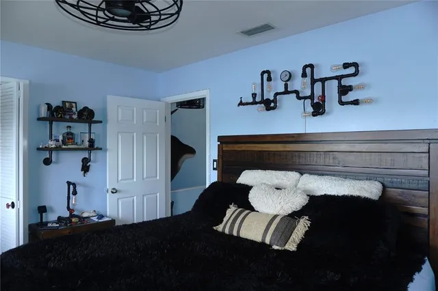 a view of hallway with a book shelf