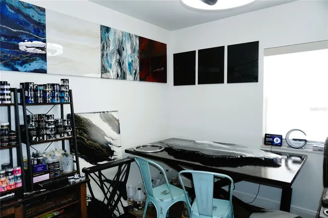 a view of a workspace with furniture