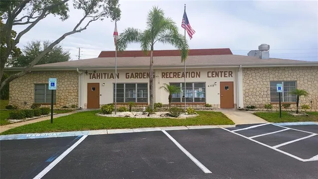 a room with furniture pool table and table soccer