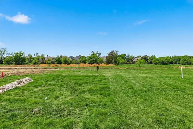 a view of lake with green space
