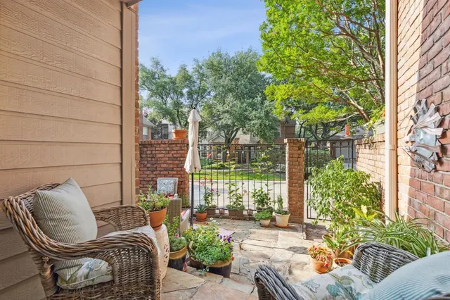 a outdoor living space with furniture and garden view