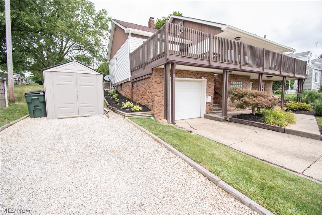 734 Rice Street Alliance, OH 44601 - Photo 2 of 28 2 different exits from 2 different (tandem) car garages, a great view of the park, lots of storage spaces, a nice size shed, and a nice backyard.