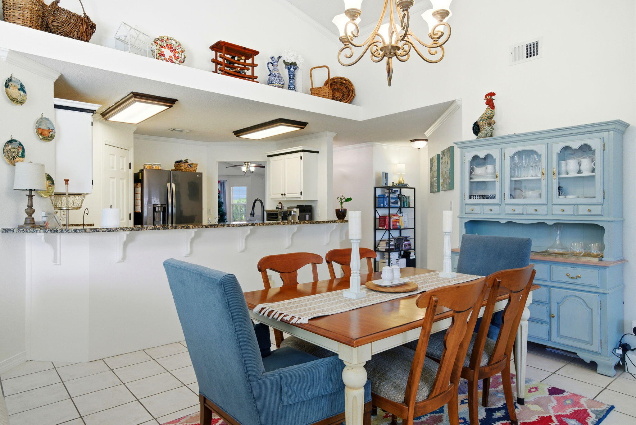 570 Rough Leaf Lane Mary Esther, FL 32569 - Photo 20 of 58 a dining room with a wooden table and chairs