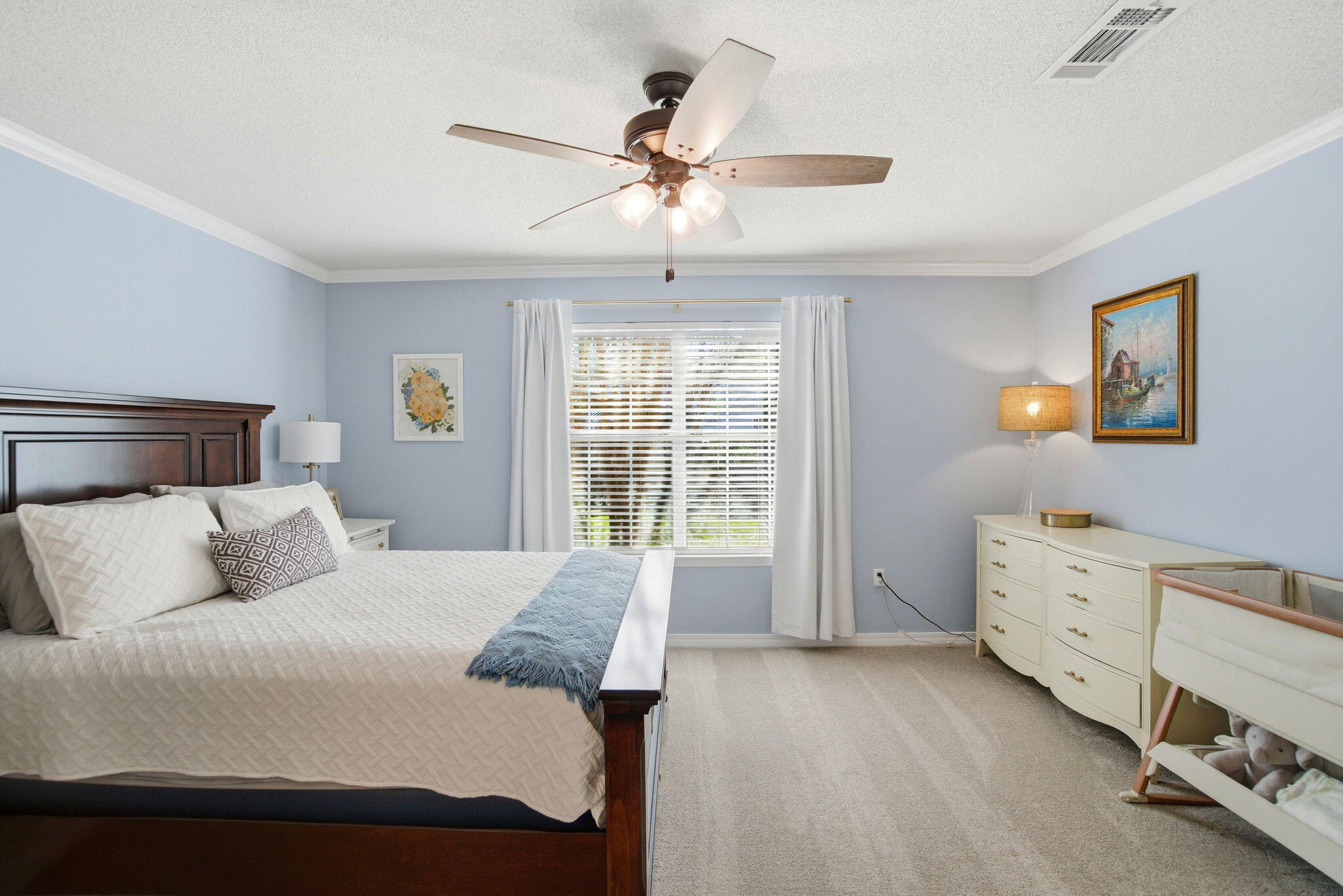 570 Rough Leaf Lane Mary Esther, FL 32569 - Photo 27 of 58 a bedroom with a bed and a dresser