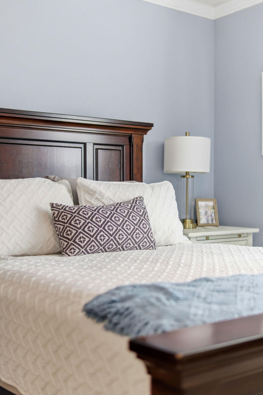 570 Rough Leaf Lane Mary Esther, FL 32569 - Photo 29 of 58 a bedroom with a bed and a night stand