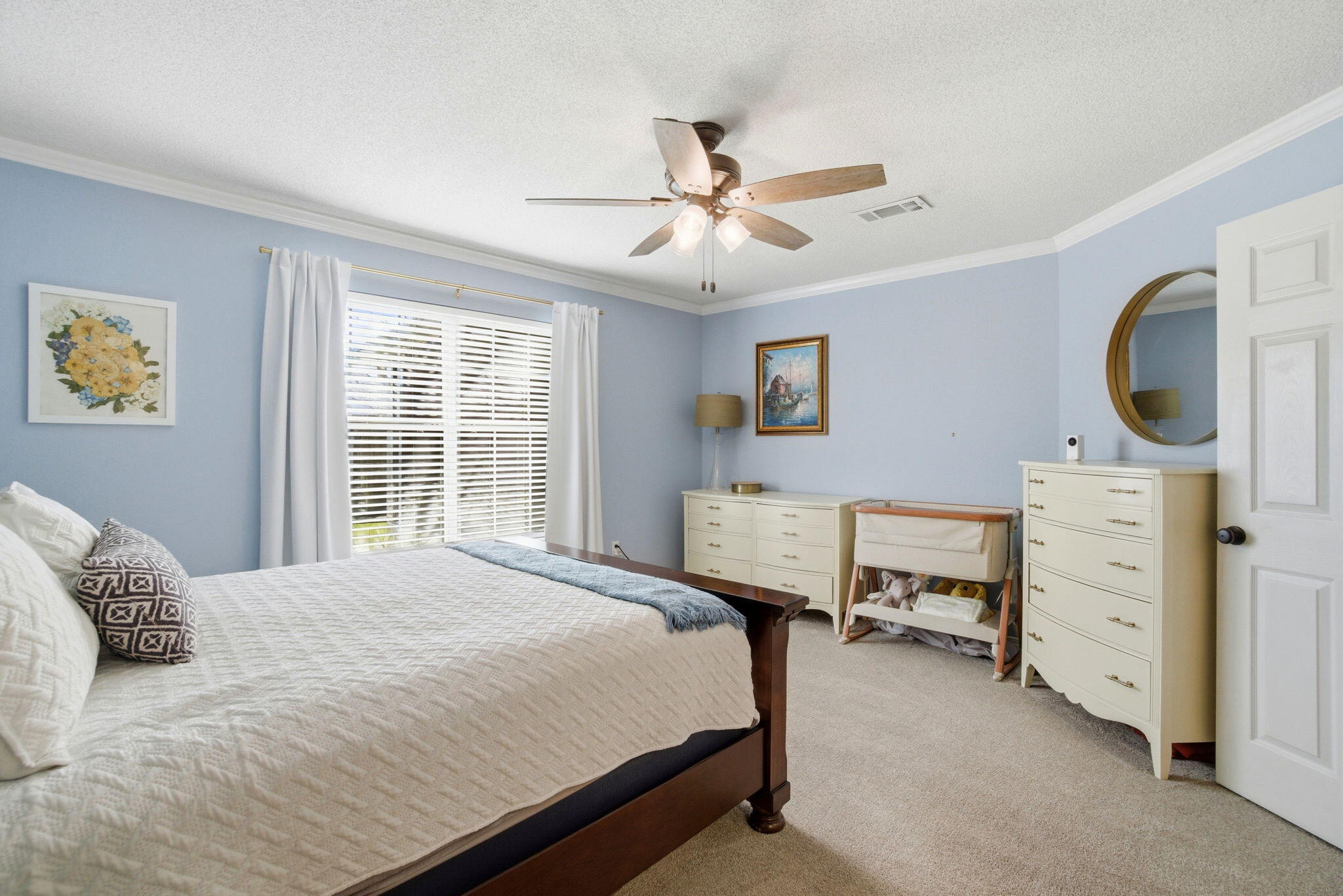 570 Rough Leaf Lane Mary Esther, FL 32569 - Photo 31 of 58 a bedroom with a bed and a dresser