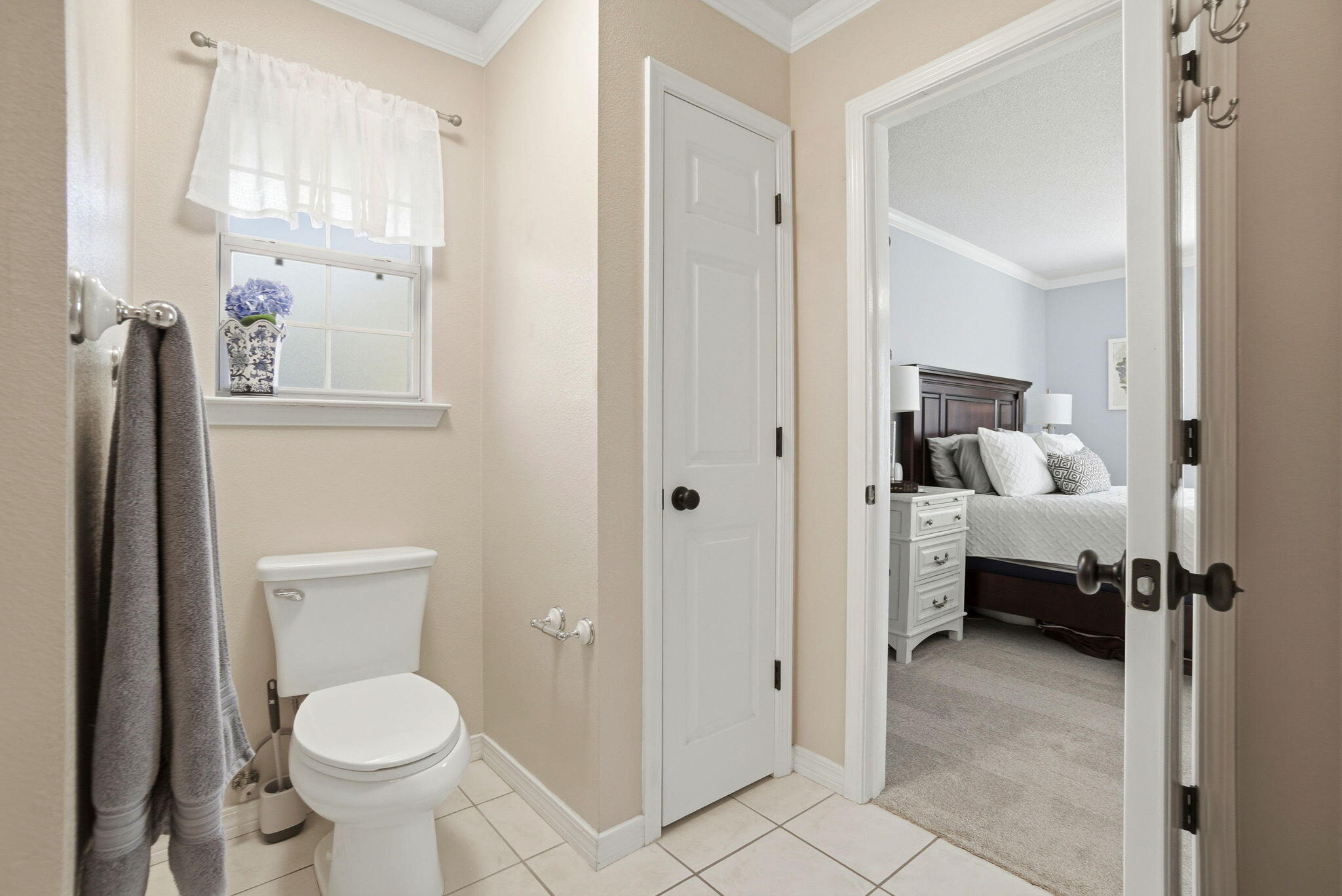 570 Rough Leaf Lane Mary Esther, FL 32569 - Photo 34 of 58 a bathroom with a toilet sink and shower