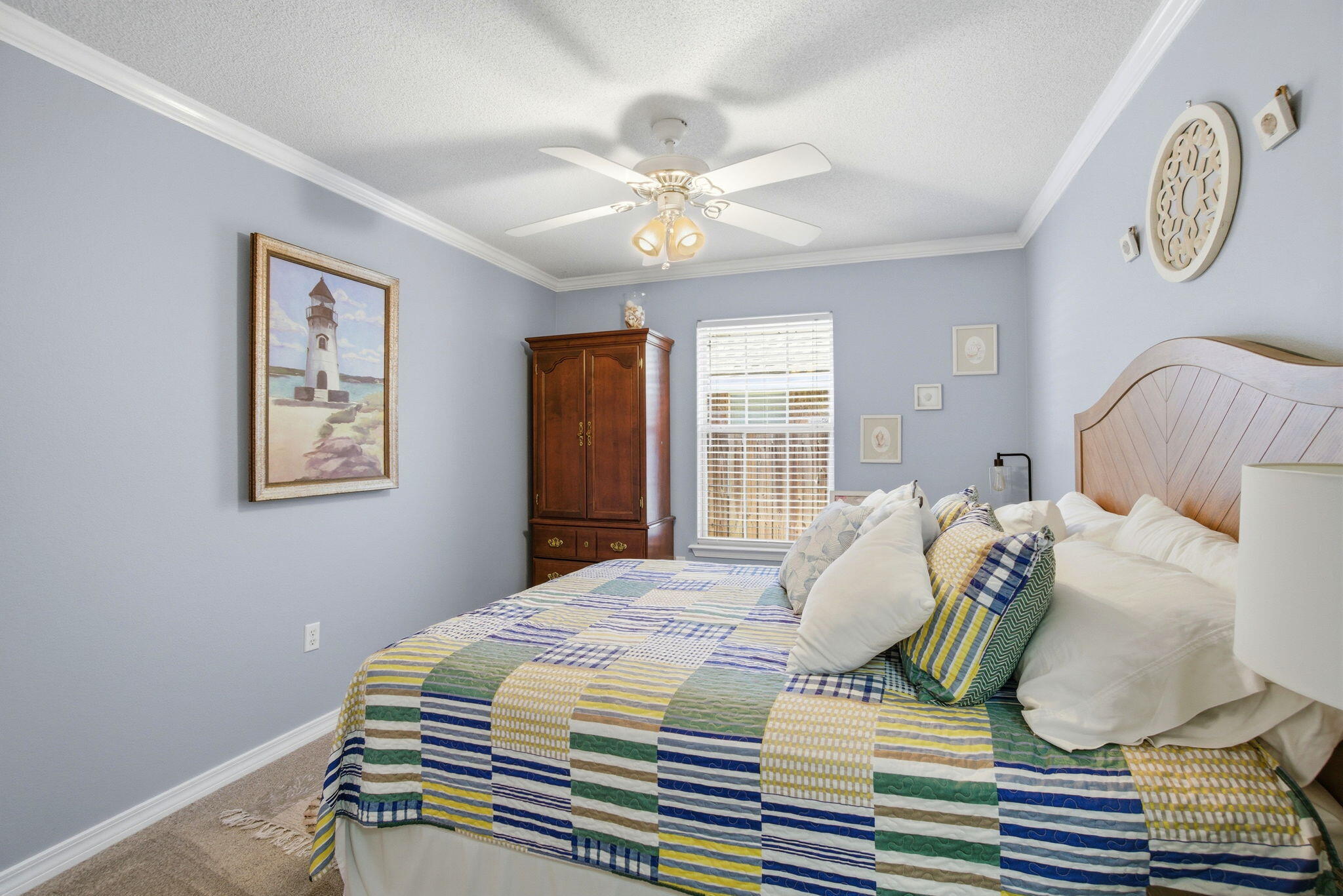 570 Rough Leaf Lane Mary Esther, FL 32569 - Photo 41 of 58 a bedroom with a bed and window