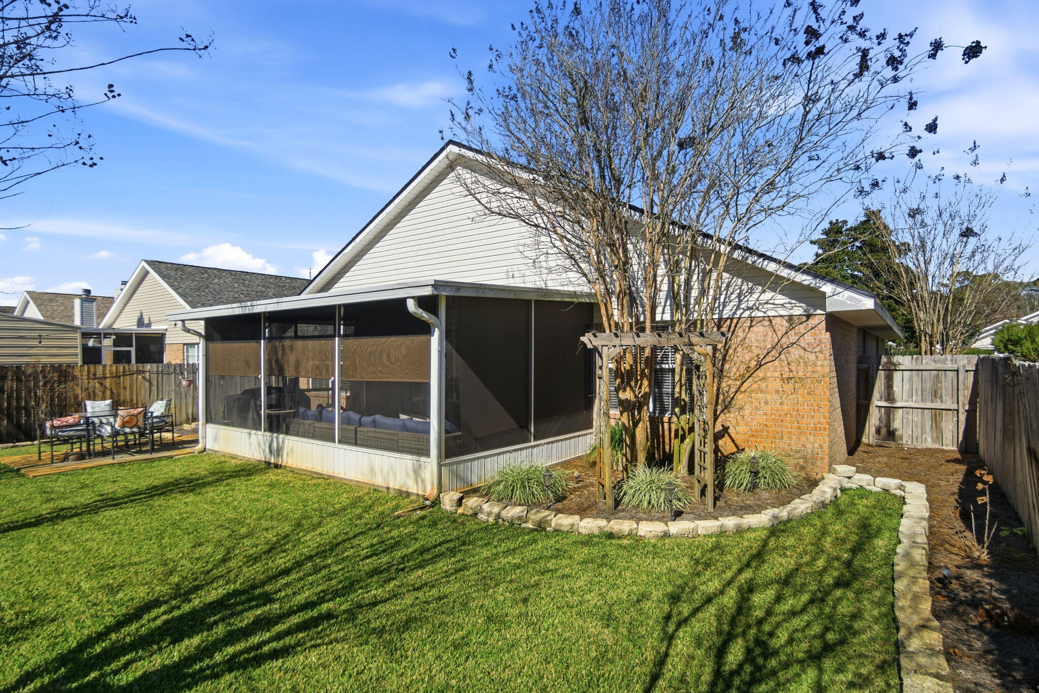 570 Rough Leaf Lane Mary Esther, FL 32569 - Photo 53 of 58 a view of a house with backyard and porch