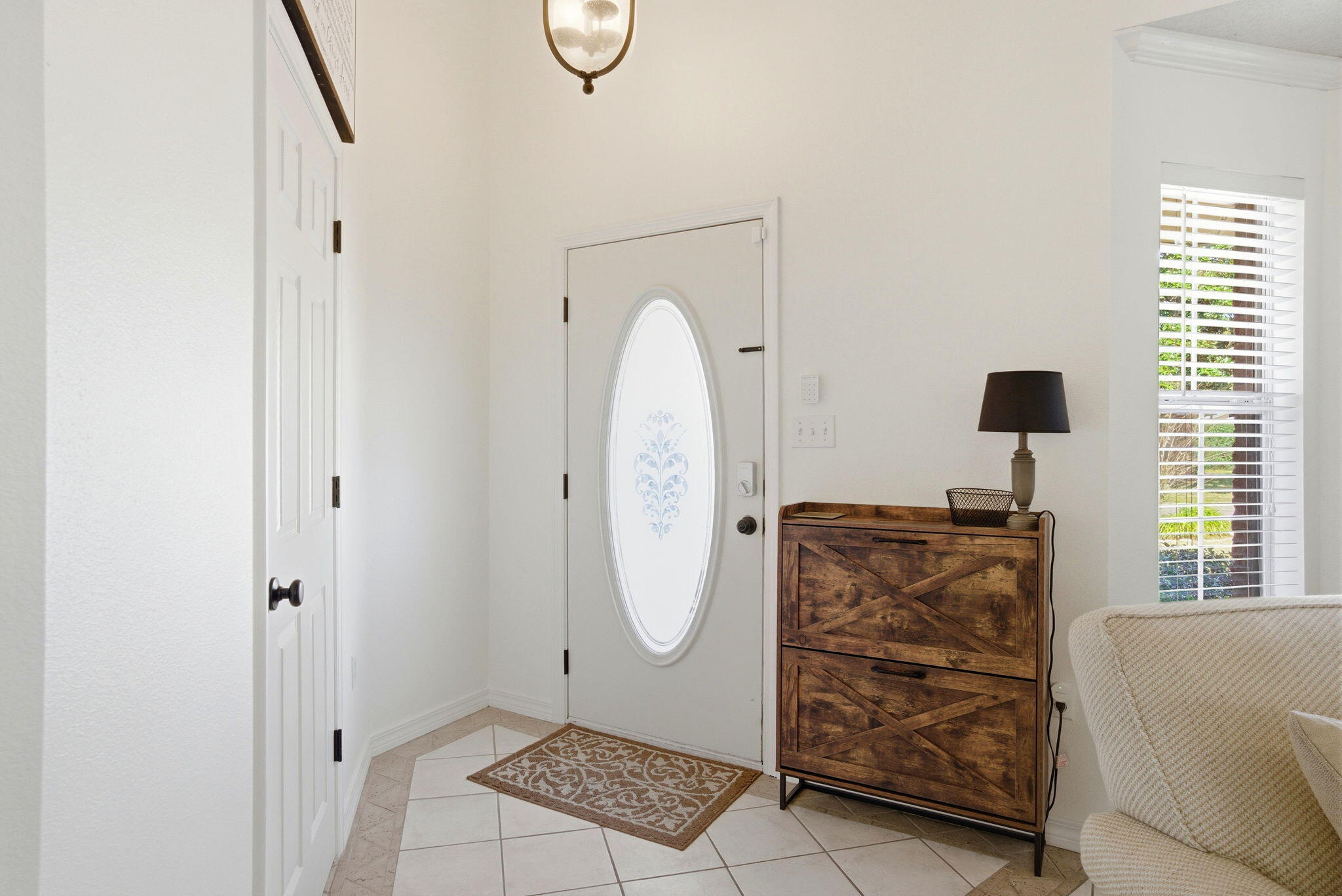 570 Rough Leaf Lane Mary Esther, FL 32569 - Photo 6 of 58 a room with a walk in closet and a window