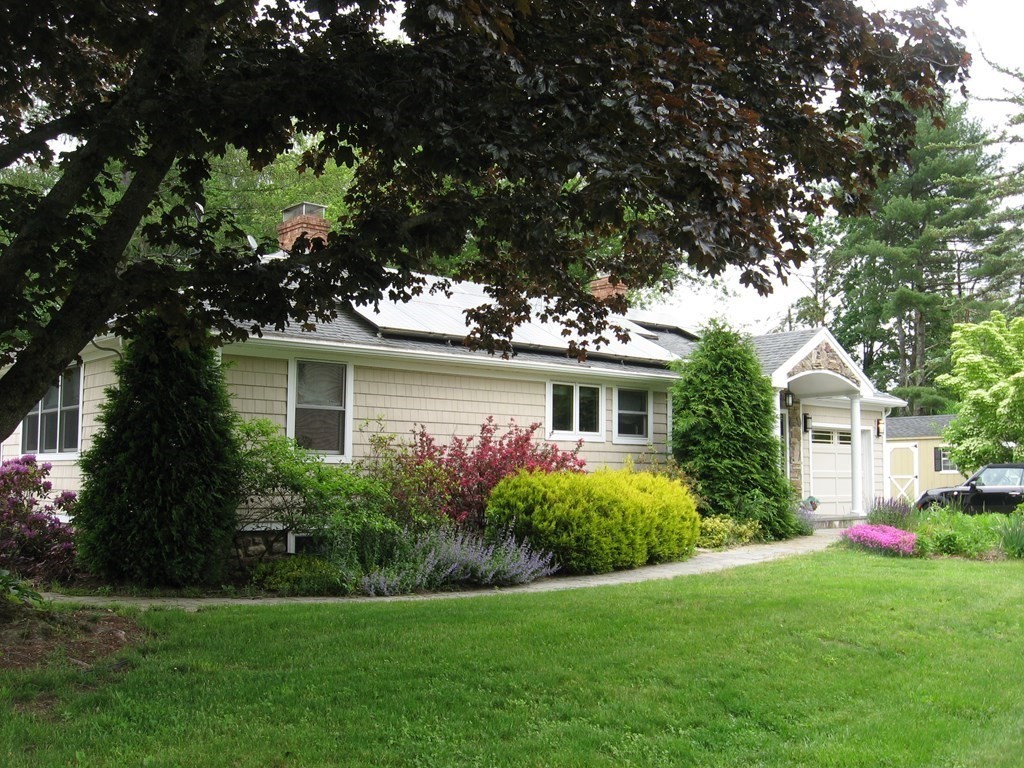 2 Fieldcrest Road Sturbridge, MA 01566 - Photo 1 of 39 a front view of house with yard and green space