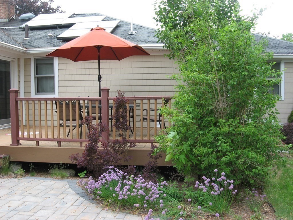 2 Fieldcrest Road Sturbridge, MA 01566 - Photo 11 of 39 a view of a house with yard and sitting area