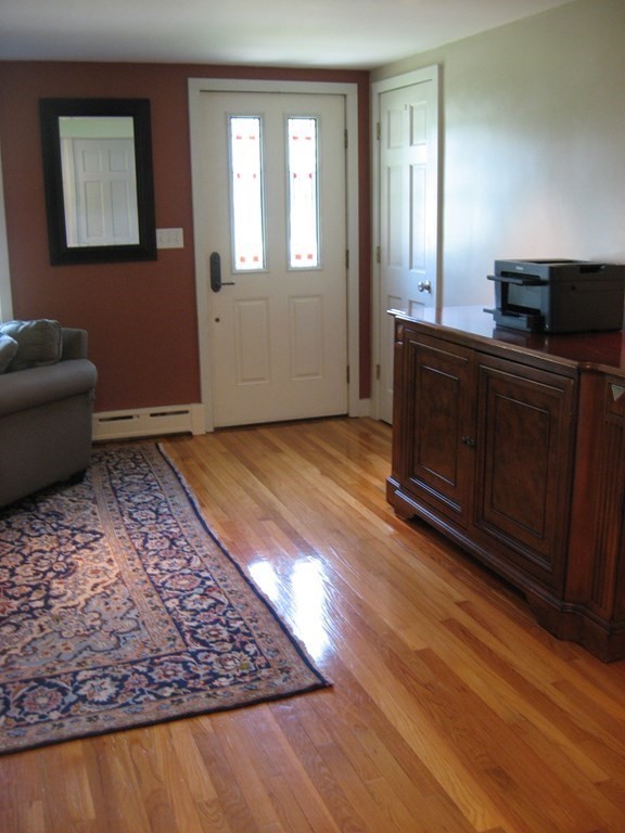 2 Fieldcrest Road Sturbridge, MA 01566 - Photo 17 of 39 a view of a livingroom with wooden floor and furniture