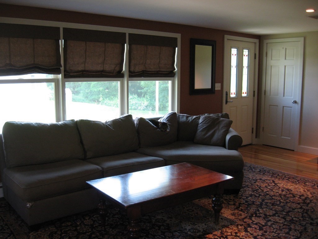 2 Fieldcrest Road Sturbridge, MA 01566 - Photo 21 of 39 a living room with furniture and a large window