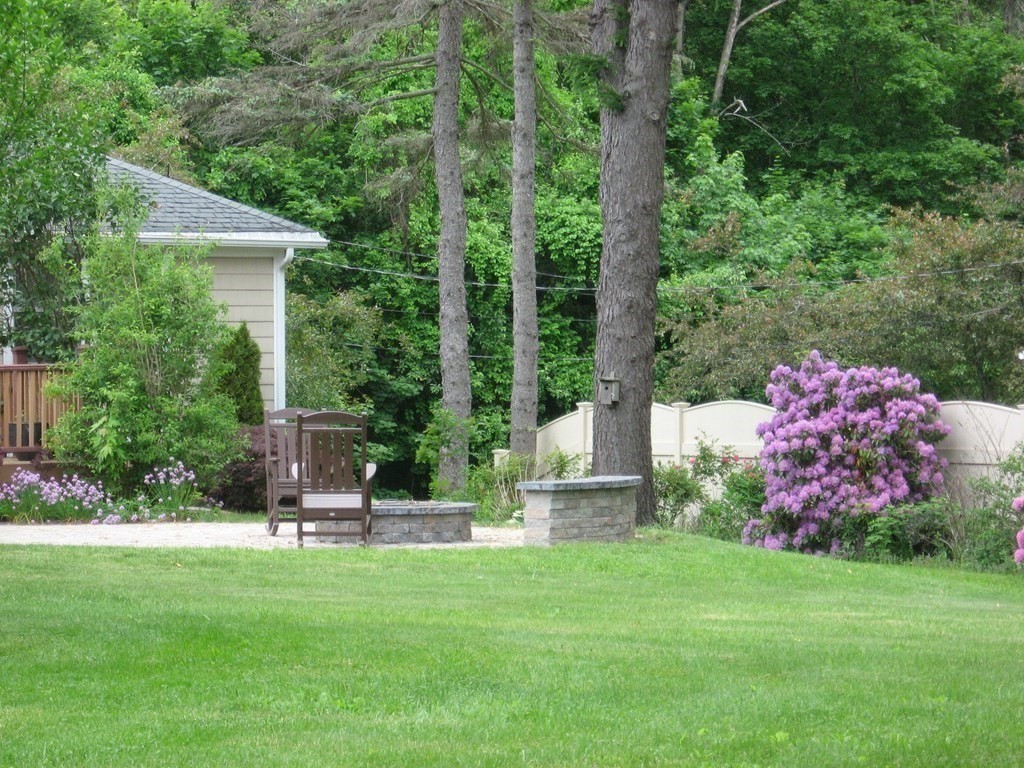 2 Fieldcrest Road Sturbridge, MA 01566 - Photo 8 of 39 a front view of a house with garden