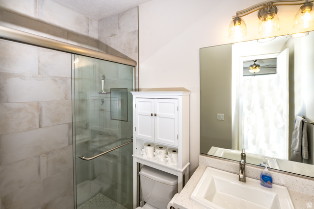 1283 North Gallen Road Santa Clara, UT 84765 - Photo 38 of 103 Bedroom 2 en-suite Bathroom with a stall shower and vanity