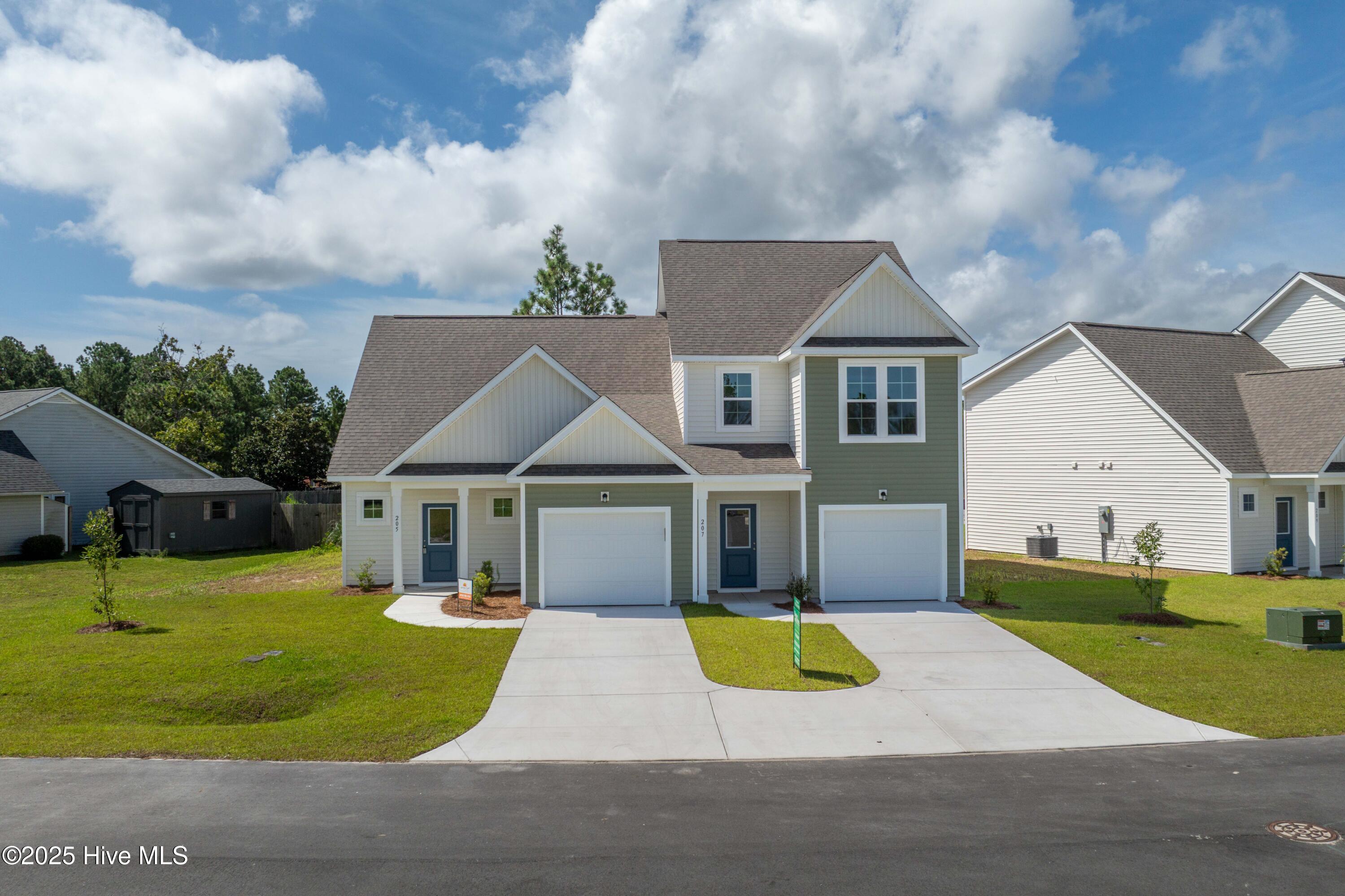 207 Sandpiper Place Holly Ridge, NC 28445 - Photo 1 of 27 Front
