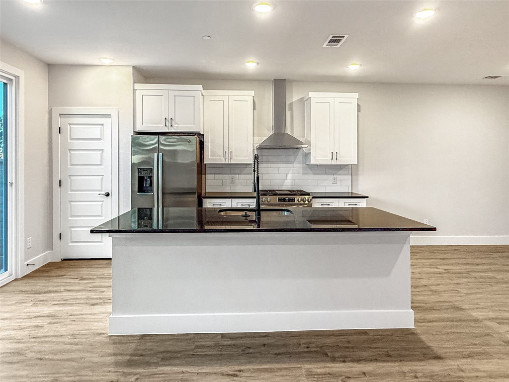 5603 Mobeetie Loop Bee Cave, TX 78738 - Photo 6 of 22 chef island kitchen with granite countertops