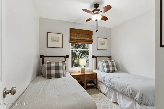 a bathroom with a sink a mirror and a vanity