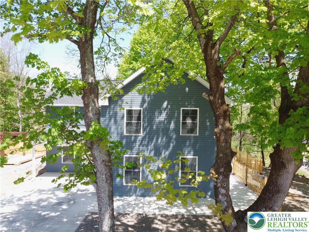 1500 Rock Street, Unit 1 Lehighton, PA 18235 - Photo 13 of 67 a front view of a house with garden