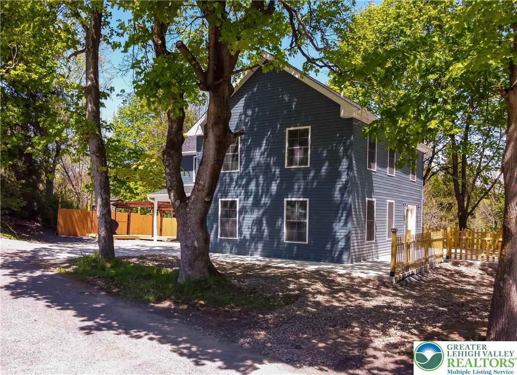 1500 Rock Street, Unit 1 Lehighton, PA 18235 - Photo 15 of 67 a front view of a house with a tree