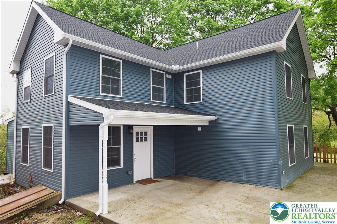 1500 Rock Street, Unit 1 Lehighton, PA 18235 - Photo 2 of 67 a front view of a house with a garage