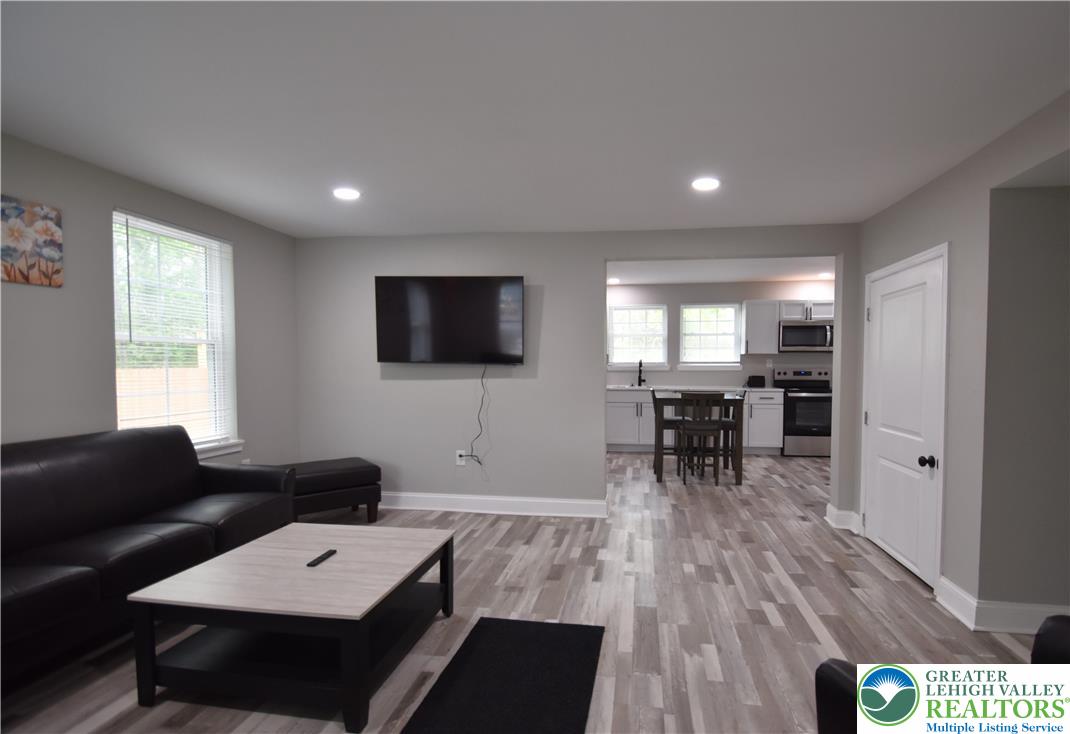 1500 Rock Street, Unit 1 Lehighton, PA 18235 - Photo 22 of 67 a living room with furniture and a flat screen tv