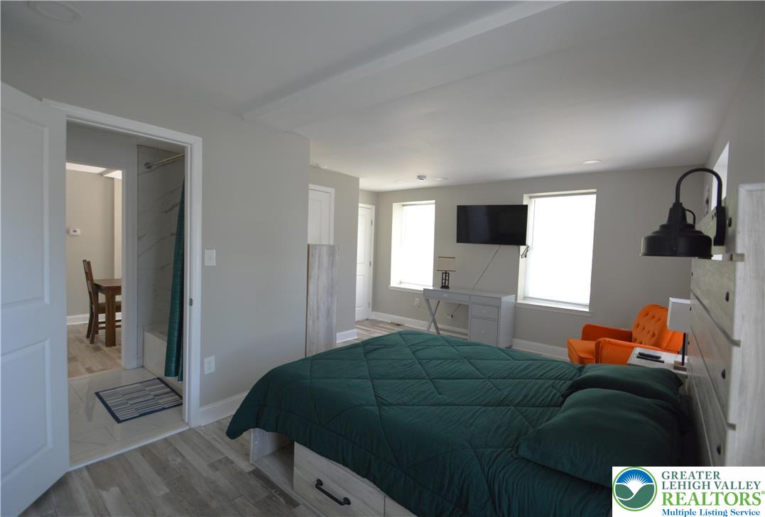1500 Rock Street, Unit 1 Lehighton, PA 18235 - Photo 35 of 67 a bedroom with a bed and a television
