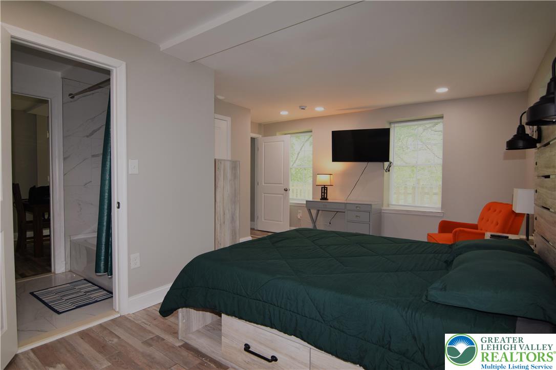1500 Rock Street, Unit 1 Lehighton, PA 18235 - Photo 38 of 67 a bedroom with a bed and a television
