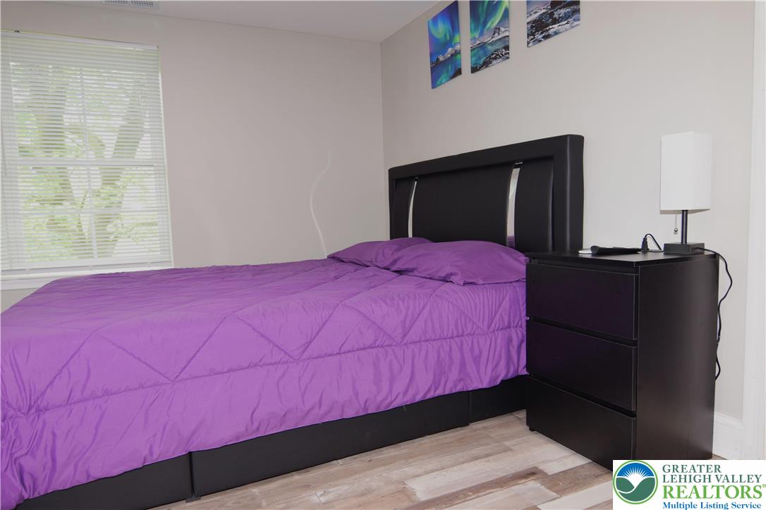 1500 Rock Street, Unit 1 Lehighton, PA 18235 - Photo 47 of 67 a bedroom with a bed and a dresser