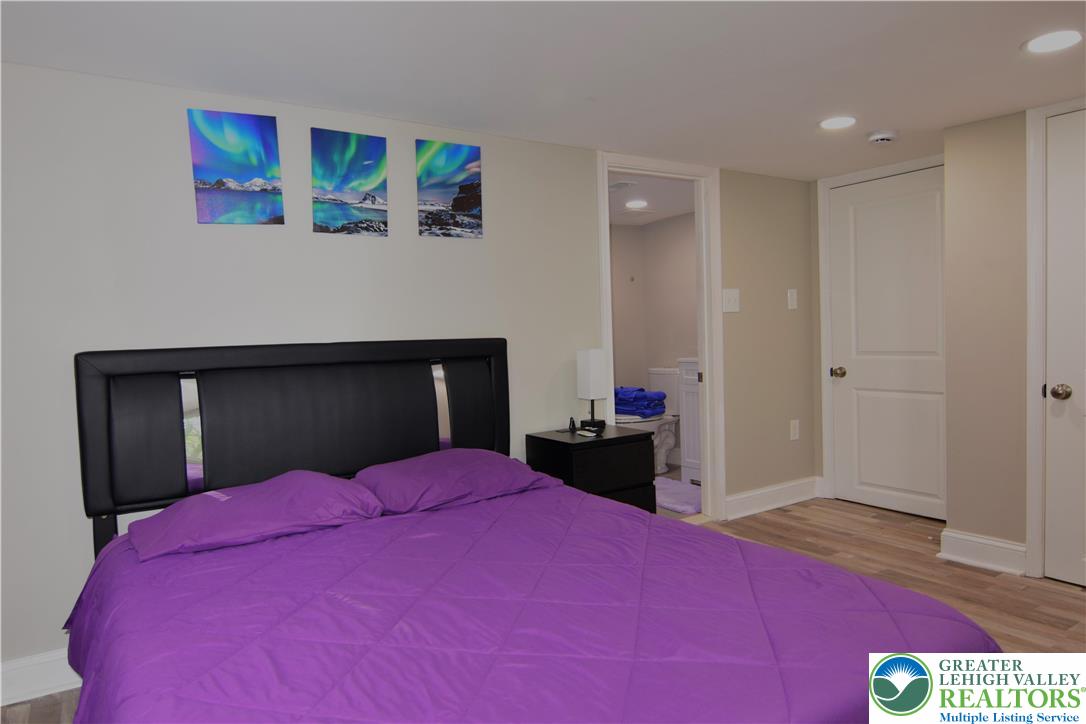1500 Rock Street, Unit 1 Lehighton, PA 18235 - Photo 48 of 67 a bedroom with a bed and a view of kitchen