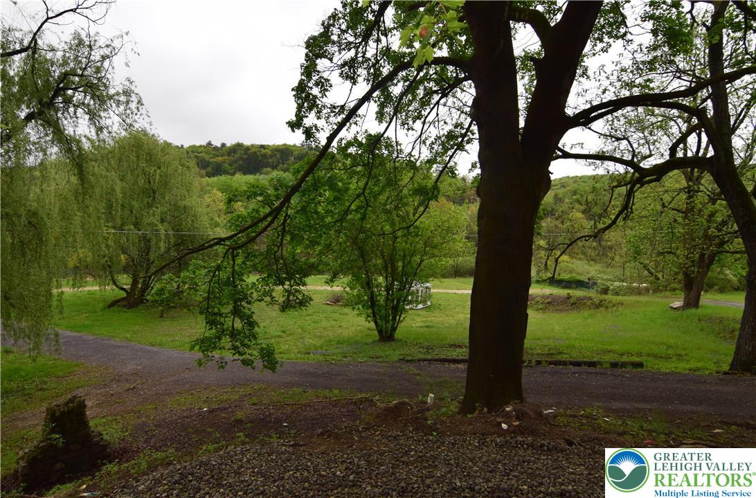 1500 Rock Street, Unit 1 Lehighton, PA 18235 - Photo 63 of 67 a view of a yard with plants and trees