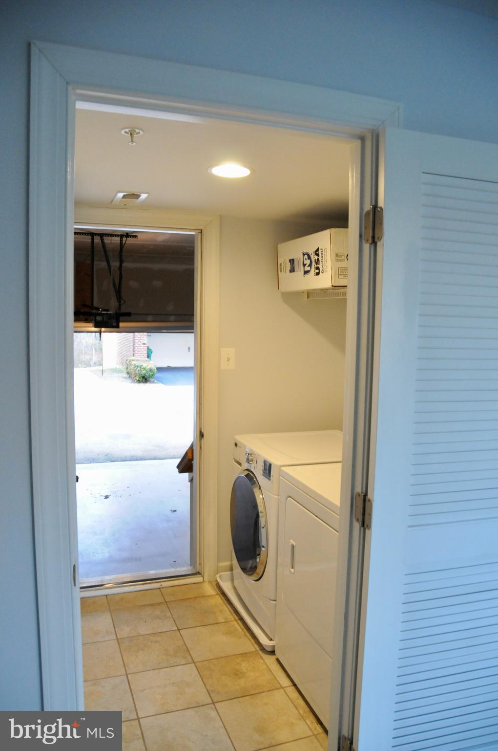 336 Grand Street Gaithersburg, MD 20878 - Photo 9 of 28 From Garage thru Laundry Area to Foyer