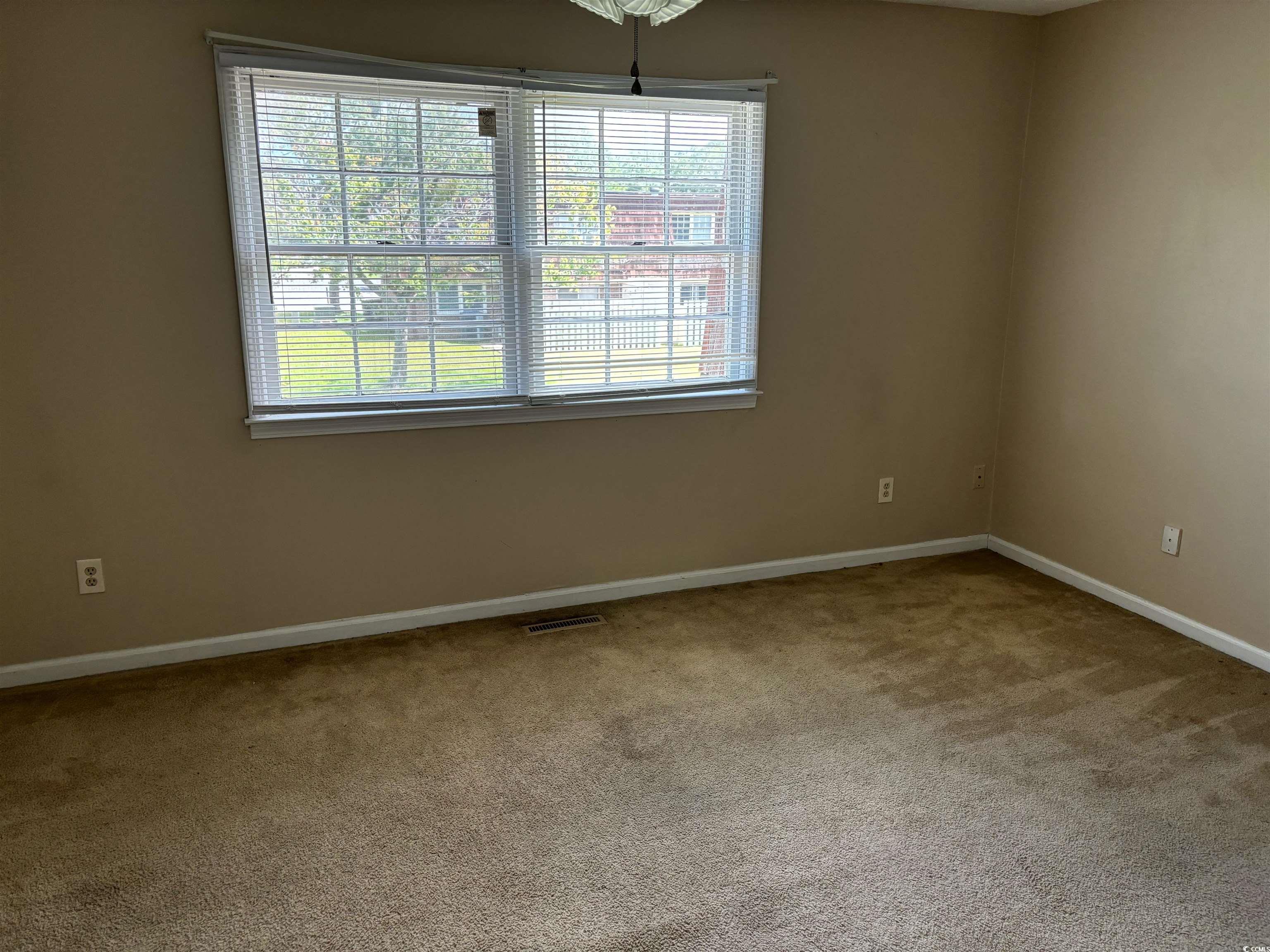 1025 Carolina Road, Unit G3 Conway, SC 29526 - Photo 2 of 11 Unfurnished room featuring carpet floors