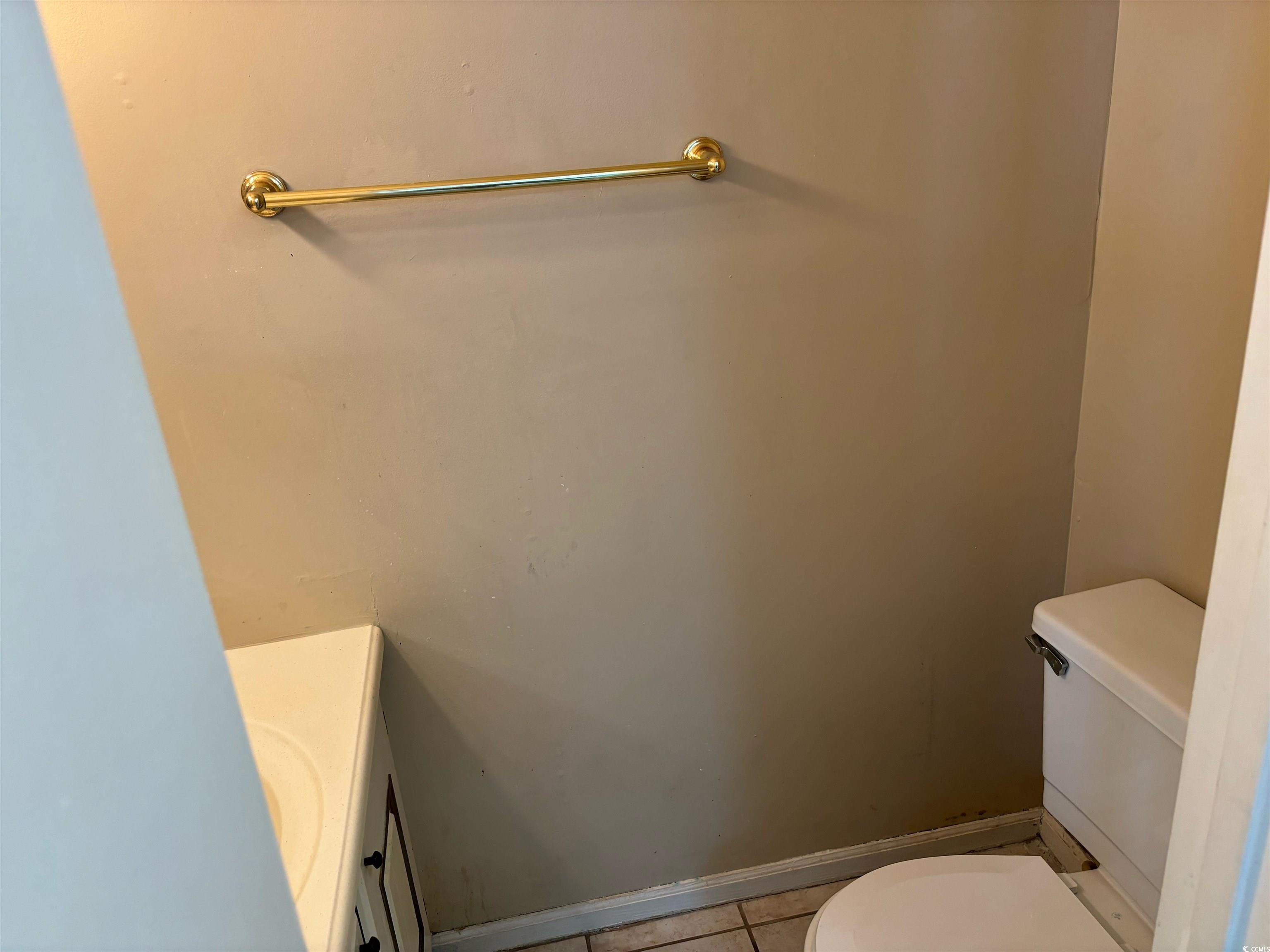 1025 Carolina Road, Unit G3 Conway, SC 29526 - Photo 7 of 11 Bathroom featuring toilet, tile patterned flooring, and vanity
