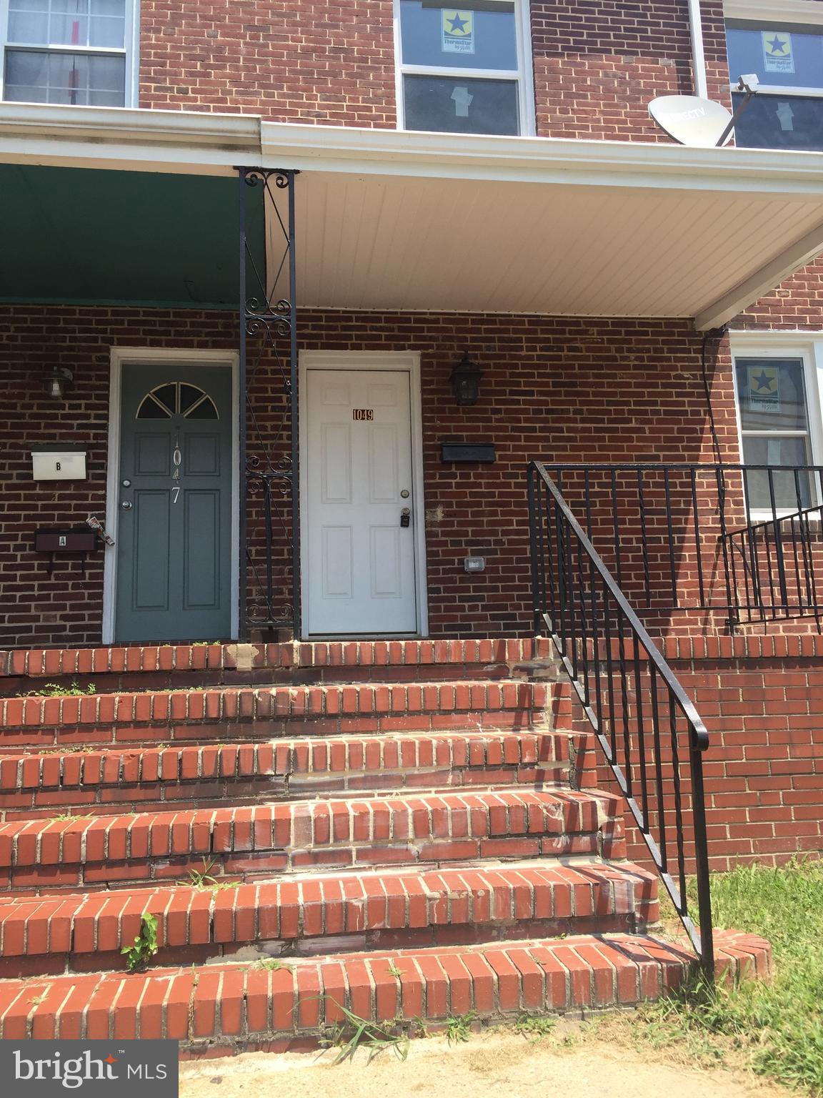 1049 Desoto Road Baltimore, MD 21223 - Photo 5 of 47 a view of a house with a balcony