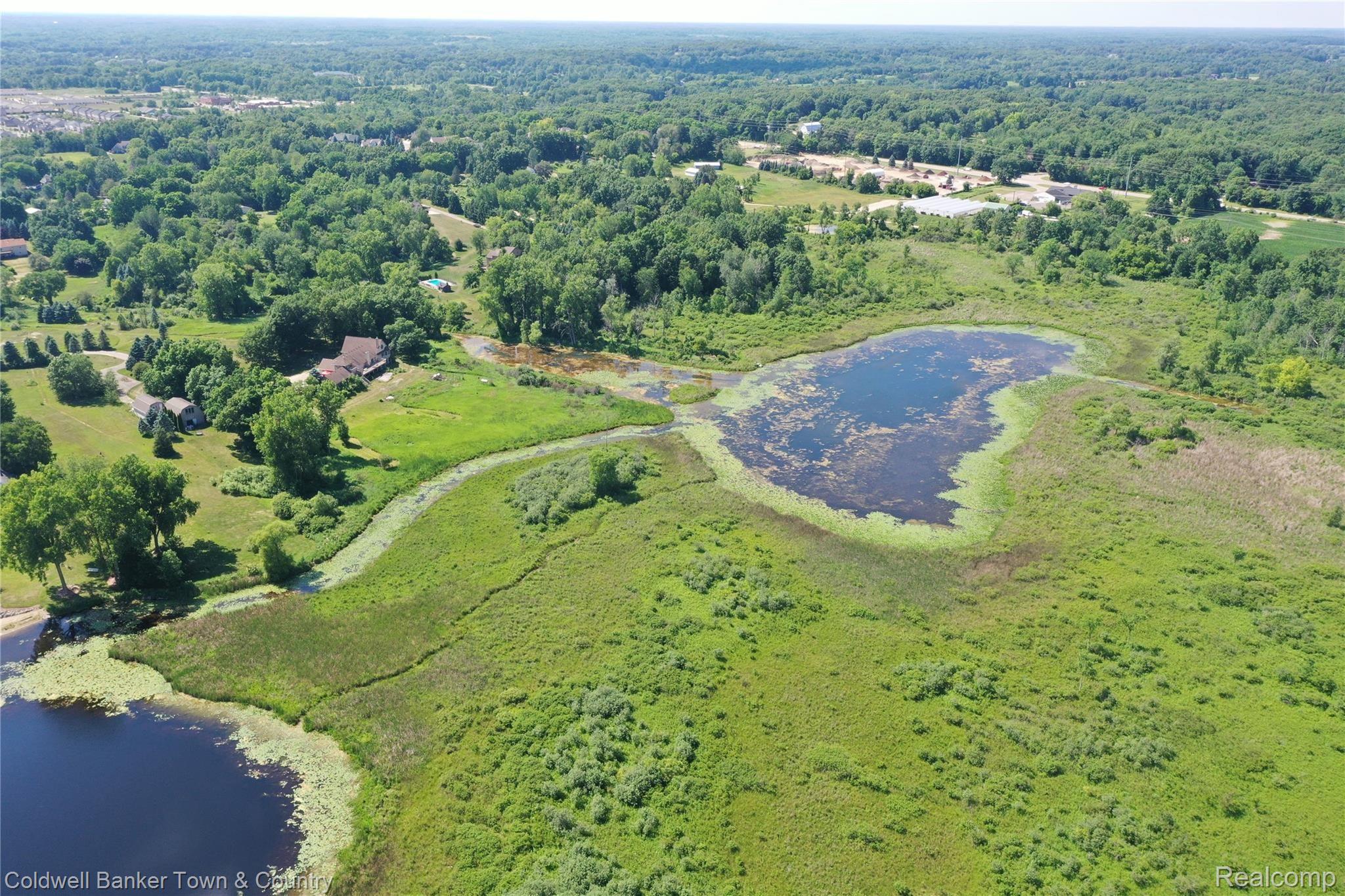 1697 North Hughes Road Howell, MI 48843 - Photo 53 of 61 LOGAN LAKE