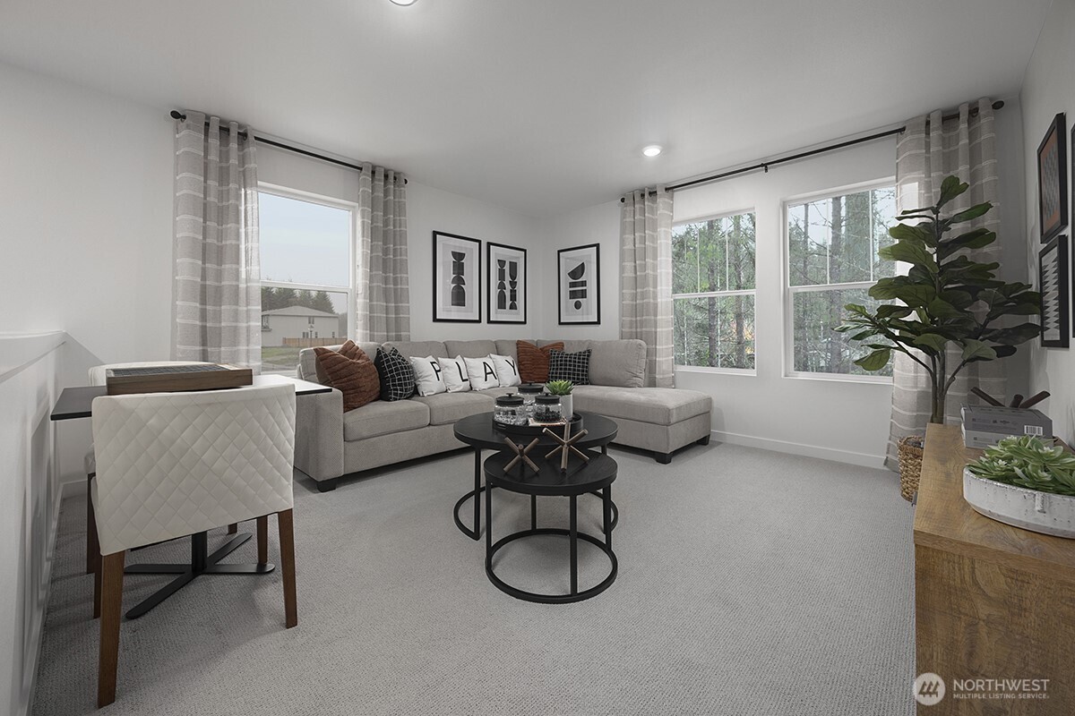 23730 35th Drive Southeast, Unit 43 Bothell, WA 98021 - Photo 6 of 10 a living room with furniture and a large window